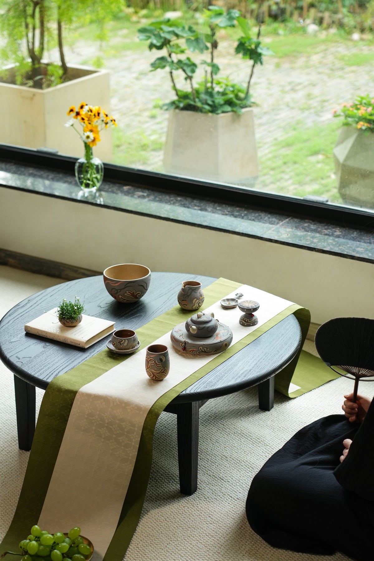 Complete tea setting with Dunhuang-inspired tea set; styling props not included