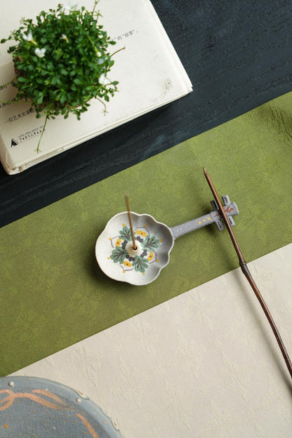 Pipa-shaped incense holder; incense and tea needle not included