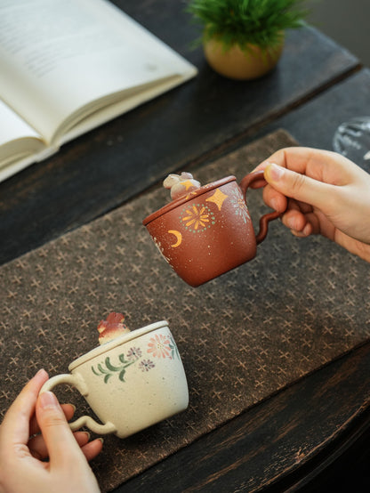 White and red clay Niu Ma lidded cups; each sold separately