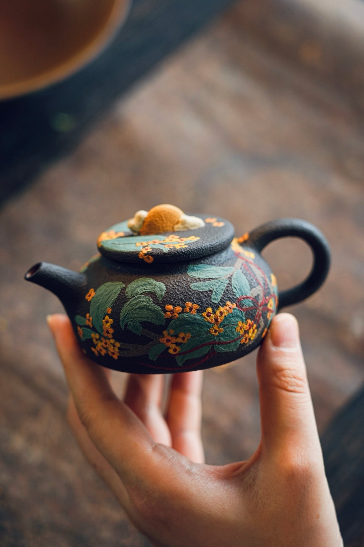 Floral teapot with sculpted lid detail